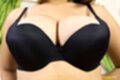 Wearing black bra big tits