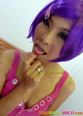 Purple haired Annlee stripping and taking self shot pictures